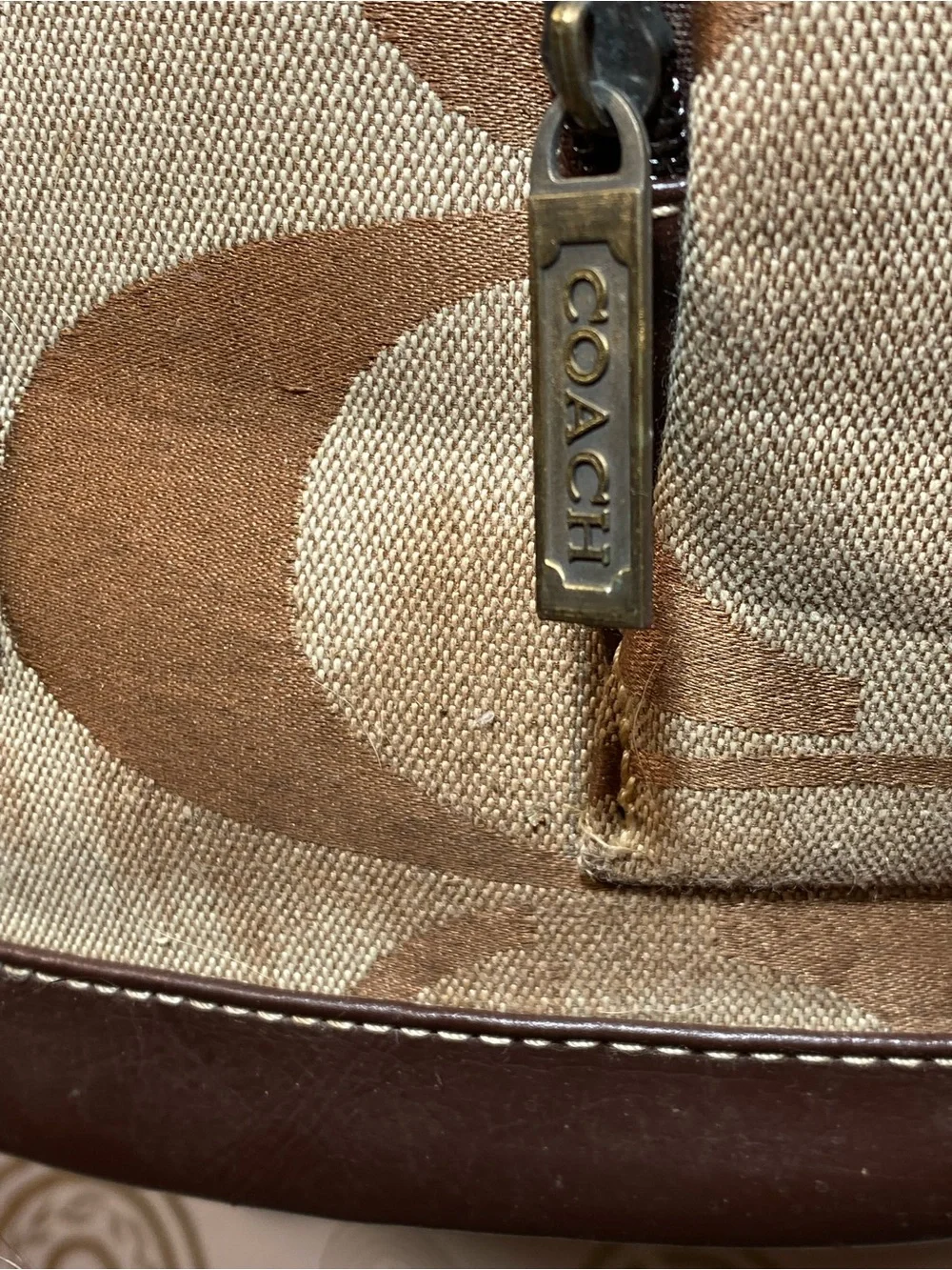 C Brown and Tan Signature Canvas Backpack